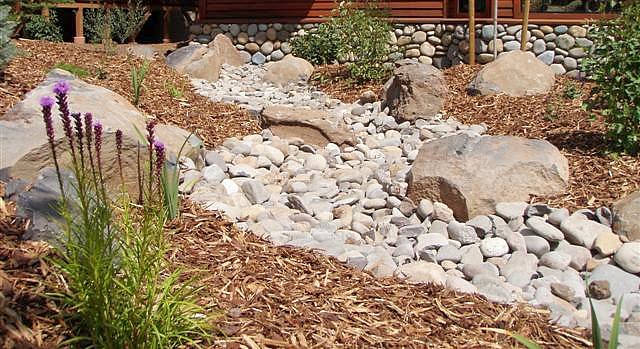 Dry creek across low maintenance Tahoe Donner front yard